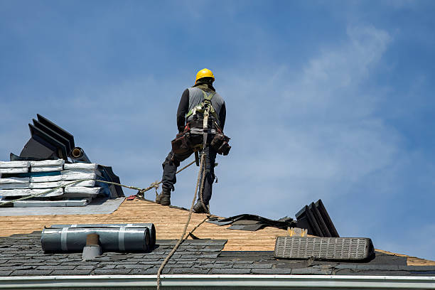Professional Roofing technician working in Montebello, VA
